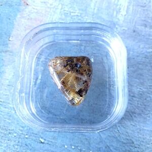 Rutilated Quartz cabouchon.